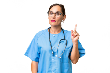 Middle-aged nurse woman over isolated background thinking an idea pointing the finger up