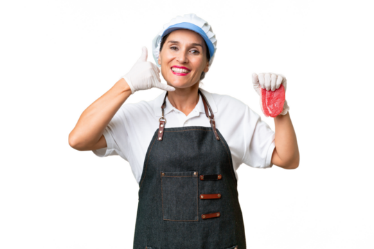 Butcher woman wearing an apron and serving fresh cut meat over isolated background making phone gesture. Call me back sign