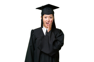 Young university graduate Asian woman over isolated background with surprise and shocked facial expression