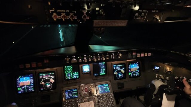 Real time landing in a real night flight, as seen by the pilots from the cockpit. Closeup view of the copilot’s side. Runway 24L, Palma de Mallorca airport.