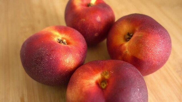 Freshly picked ripe peaches Rotating
