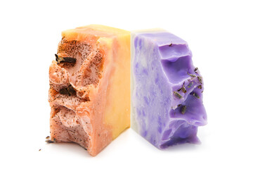 Lavender and orange handmade soap with flowers isolated on white background. Organic body care products.
