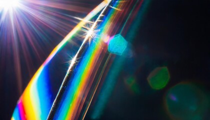 lens flare abstract bokeh lights leaking reflection of a glass diamond crystal jewelry defocused shining colorful rainbow light leaks rays on black background