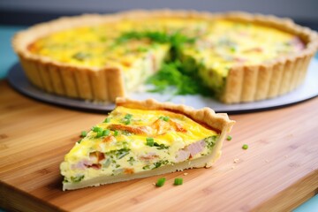 Fototapeta na wymiar sliced quiche with melted cheese oozing out