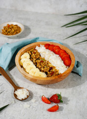 Photo shoot of a healthy smoothie bowl with fruits and granola