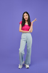 portrait of body Asian woman who looks happy against a purple background blank copy space for your advertising content.