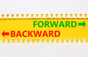 Forward or backward symbol. Concept word Forward or Backward on beautiful yellow paper. Beautiful...