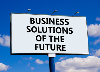 Business solutions of the future symbol. Concept words Business solutions of the future on beautiful billboard. Beautiful blue sky background. Business solutions of the future concept. Copy space