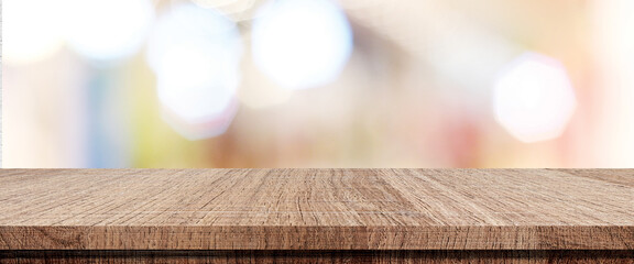 Table and blur background, Wooden counter over blur bokeh light background, Brown wood table top, shelf for food and retail shop, store product display backdrop, banner, mockup, template