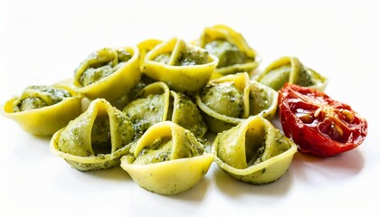 tortellini pasta with pesto and sun dried tomatoes isolated on a white background top and side view italian food bundle - obrazy, fototapety, plakaty