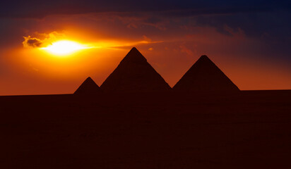 Giza Pyramid Complex at amazing sunset - Cairo, Egypt