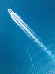 Drone shot of motor boat in the sea