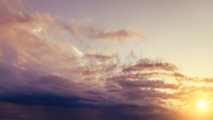 Sunset sky with orange clouds. Nature background.