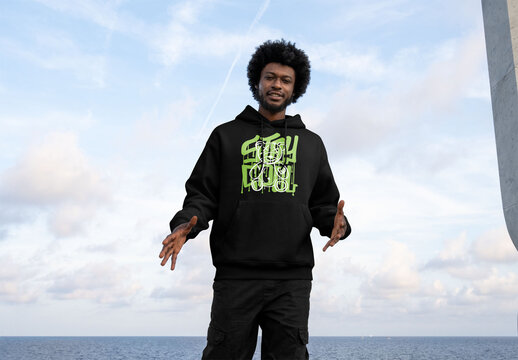 Mockup of man wearing customizable hoodie, gesturing