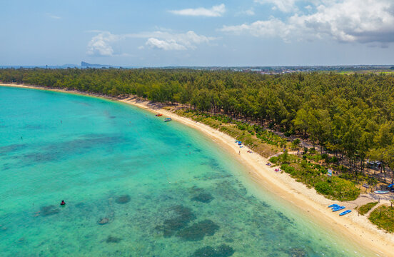 Aerial view of beach and turquoise water at Le Clos Choisy, Mauritius