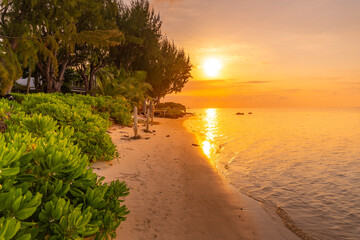 View of beach and Indian Ocean at sunset in Cap Malheureux, Mauritius
