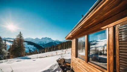 a luxurious mountain side retreat mountain house with floor to ceiling windows breathtaking views of the rugged winter landscape and cozy elegant interiors ideal for background image