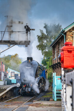 The Sir Nigel Gresley steam locomotive about to depart from Grosmont Station on the North Yorkshire Moors Railway Line, Yorkshire, England