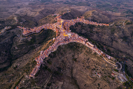 Aerial view of Centuripe, the human-shaped or star-shaped town, seen from above at dusk, Centuripe, Enna province, Sicily, Mediterranean