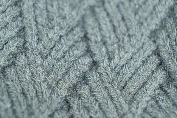 Pattern and texture of synthetic acrylic fabric close-up macro.