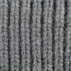 Pattern and texture of synthetic acrylic fabric close-up macro.