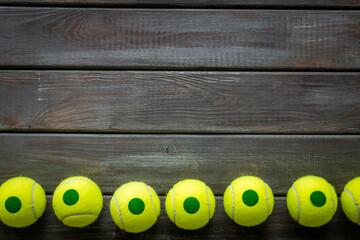 Set of green tennis balls, top view. Sport games background