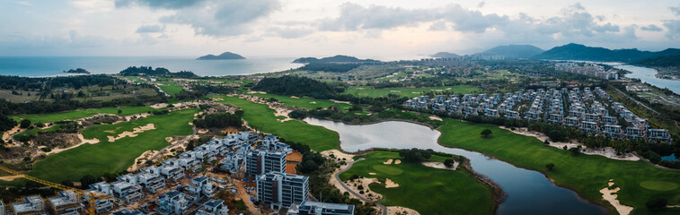 Naklejka na ściany i meble Aerial view of modern golf course resort in Hainan island , China
