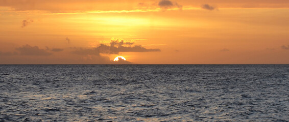 Naklejka na ściany i meble a beautiful sunset in the Caribbean Sea