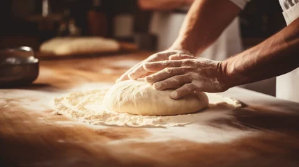 Foto op Canvas Baker's hand kneading dough © tiagozr