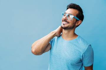 Man blue modern t-shirt trendy beard style smile portrait glasses fashion background lifestyle