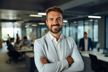 Happy confident american businessman in office looking at camera