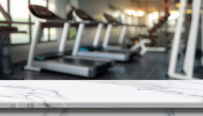 Empty white marble table space platform and fitness gym background. Product display montage Concept.