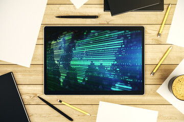 Top view of modern digital tablet display with abstract graphic world map, big data and networking concept. 3D Rendering