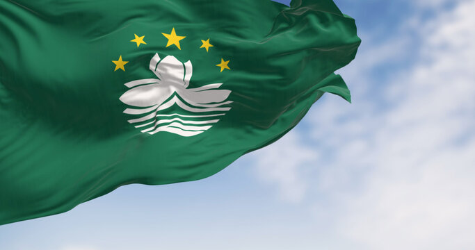 Close-up of Macau flag waving on a clear day