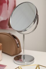 Dressing table with mirror and cosmetic products