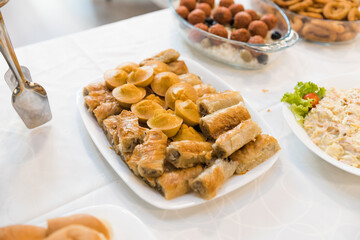 assortment of delicious appetizers, expertly arranged on a captivating catering table