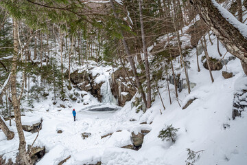 Hiker in Franconia Notch State Park . New Hampshire mountains. USA