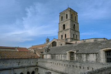 Fototapeta na wymiar Cloister and tower of the Church of St Trophime, Saint Trophime cathedral, Arles, Provence, France.