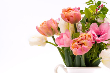 Elegant mixed pastel colored spring bouquet on white background. Spring tulips. Tulips bouquet.