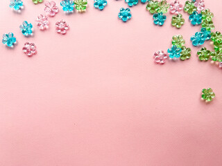 Composition with delicate flowers on pink background, card, space for text, women's holiday 