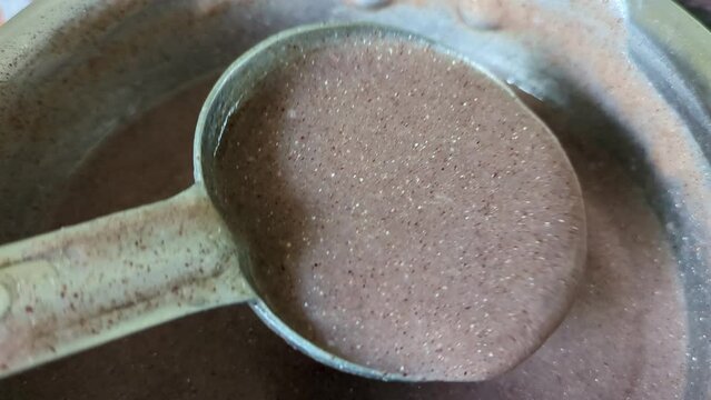 Preparing ragi malt a healthy finger millet porridge, an ultimate health food