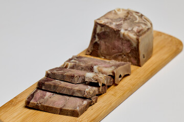 (Toba), traditional Romanian food product on a wooden chopper made with pork.