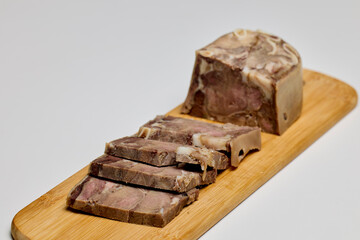 (Toba), traditional Romanian food product on a wooden chopper made with pork.