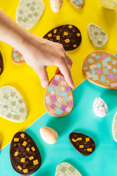 Colorful handmade Easter eggs on vibrant background