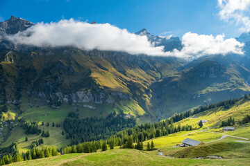 Fototapeta na wymiar Amazing touristic alpine village in valley, Switzerland attraction