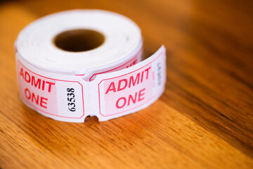 Admit one concert tickets on table close up