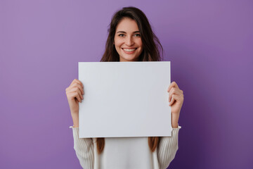 Naklejka premium Woman Holding Blank Billboard On Purple Background