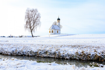 The Catholic chapel of St Maria near Moorenweis in Bavaria in Germany on a winter's day with...