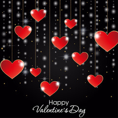 A shimmering garland and red and gold hearts on a black background. Happy Valentine's Day. Red hearts on a dark background. Congratulatory card.