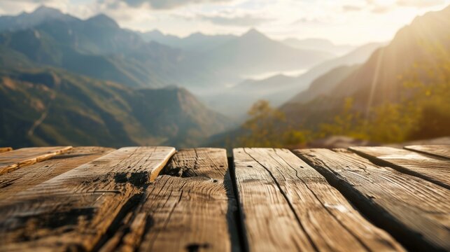 Empty Wooden Table Top Product Display Showcase Stage. Blurred Mountains In The Background, With Peaks Reaching To The Sky.